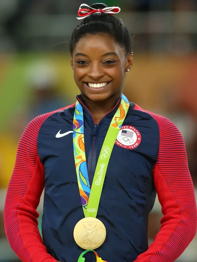 Gold-medalist-Simone-Biles-celebrates-medal-at-2016-Olympic-Games